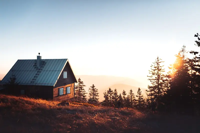 Mountain cabin at golden hour